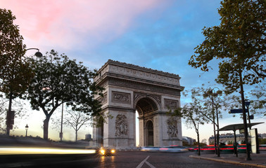 The Triumphal Arch at sunset , Paris, France.