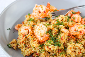 Grits cous cous with vegetables and grilled shrimp