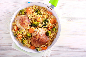 Chicken thighs with broccoli,