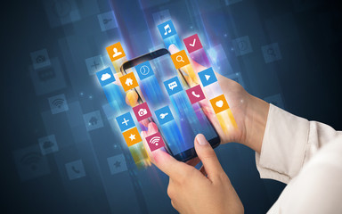 Female hand using smartphone with colorful angular fast switching application icons around