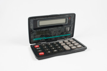 An ordinary calculator with numbers on a white background