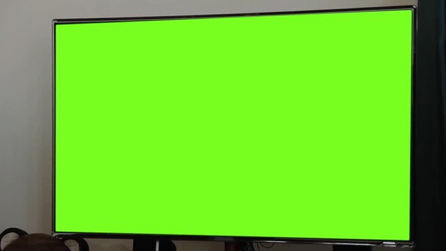 Modern Television with Chroma Key Green Screen. Zoom In. You can replace green screen with the footage or picture you want. You can do it with &ldquo;Keying&rdquo; effect (check out tutorials on YouTube).