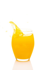 Single glass of orange juice on white background