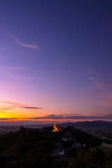 Doi Saket temple after sunset in Chiang Mai Thailand. Buddhist temple landscape.