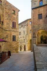 Fototapeta na wymiar Volterra old town street vertical