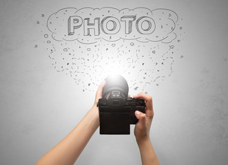 Naked hand photo shooting with message cloud concept and doodles
