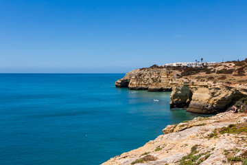 Beautiful view over cliffs and turquoise ocean in Benagil beach (Praia de Benagil)