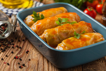 Traditional stuffed cabbage with minced meat and rice, served in a tomato sauce.