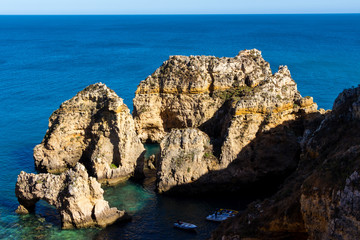 Beautiful panoramic sea view over rocks and cliffs in the Atlantic Ocean at Ponta da Piedade, Algarve region, Portugal
