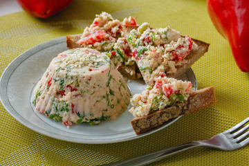 Sesame pâté with greens and bell peppers, vegan food. Concept - alternative to cheese from milk