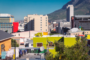 Fototapeta premium Bo Kaap colorful buildings and Cape Town city view from the hill