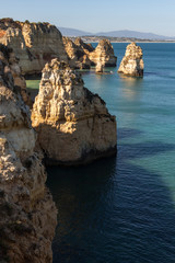 Fototapeta na wymiar Beautiful panoramic sea view over rocks and cliffs in the Atlantic Ocean at Ponta da Piedade, Algarve region, Portugal