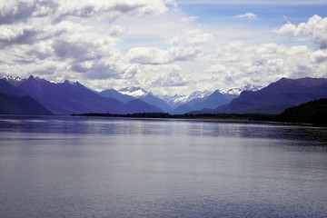 Fototapeta na wymiar Calm lake in the mountains on the cloudy day, New Zealand, South Island 