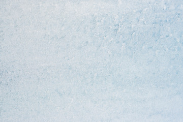 Frozen winter abstract background on the window glass with copy space
