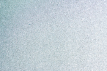 Ice background, frozen water with glass. Winter texture. Copy space.