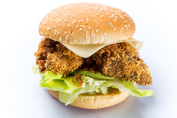 tasty burger with cheese and vegetables
