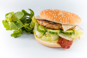tasty burger with cheese and mint lettuce