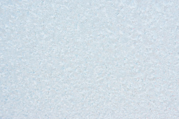 Frozen winter abstract background on the window glass with copy space