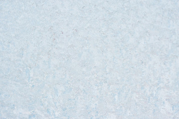 Frozen winter abstract background on the window glass with copy space