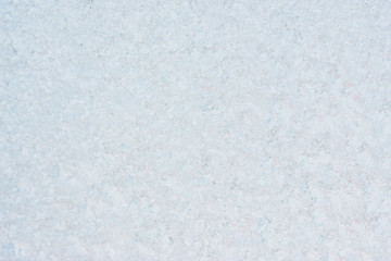 Frozen winter abstract background on the window glass with copy space