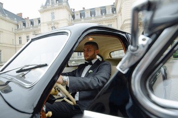 Handsome man in the car, businessman