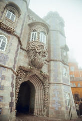 Foggy view of door of National Palace of La Pena, Sintra Portugal