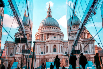 Saint Pauls cathedral in London reflecting in the shopping mall nearby