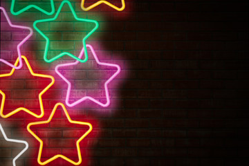 Neon lights in the form of stars on a brick wall