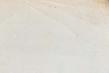 Texture of old yellowed and dilapidated paper. Grunge and retro background with space for text or image. Empty template and mockup for designers.