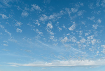 Air clouds in the blue sky. Beautiful cirrus clouds against the sky.