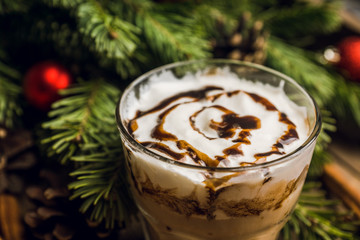 Sweet creamy latte on rustic background. Selective focus. Shallow depth of field.