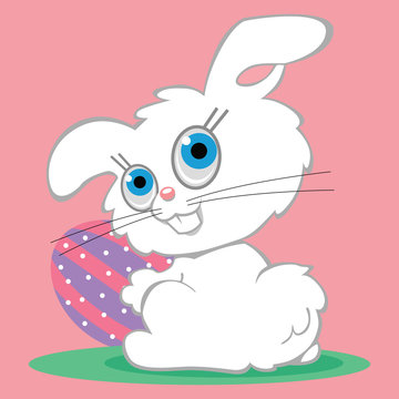 Bright white Easter Bunny holding an Easter Egg