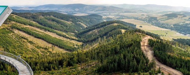 Stunning panoramic views of the mountains and forests. View from observation deck Stezka v oblacich - Sky Walk In the Czech village of Dolni Morava.