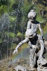 fountain with two children playing with each other