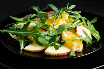 bright, aromatic fresh salad of fruits and arugula
