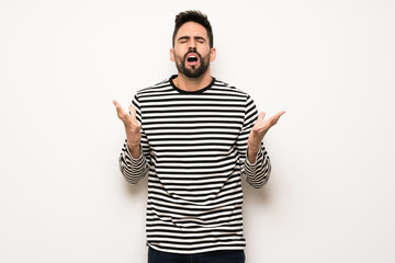 Fototapeta premium handsome man with striped shirt frustrated by a bad situation