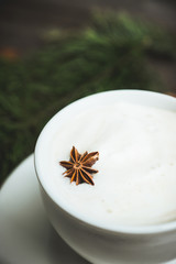 Coffee with ice cream on the table with winter decorations. Selective focus. 
