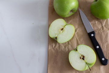 green apples on paper.