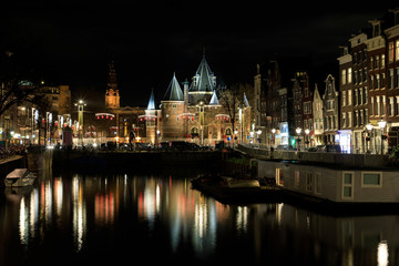 Fototapeta na wymiar De Waag building in Amsterdam at night