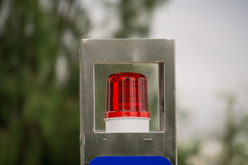 Emergency pole with help call box located in public park Thailand.