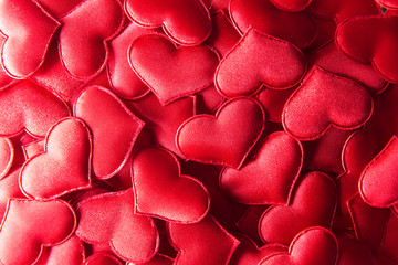 Red textile hearts closeup. Valentines day background, creative texture and love concept