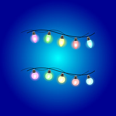 Christmas glowing lights. Garlands with colored bulbs. Xmas holidays. Christmas design element.