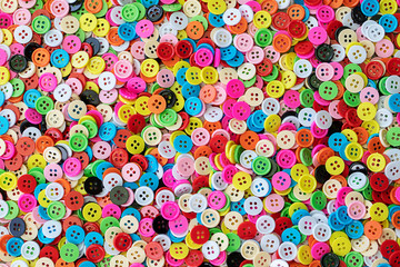 Button plastic colorful for background.