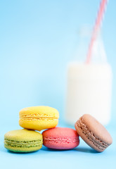 French macaron isolated on cyan
 background