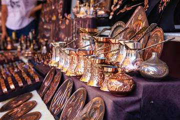 Copper jugs on the street bazaar in Mostar