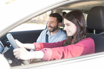 Couple Traveling By New Car