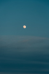 The moon in a blue night time sky