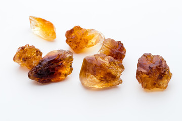 Brown caramelized sugar on white background.