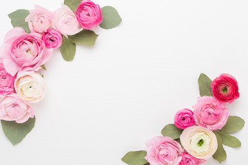 Fototapeta na wymiar Beautiful colored ranunculus flowers on a white background. Spring greeting card.