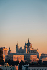 Fototapeta na wymiar View of the Almudena Cathedral at sunset, from the Templo de Debod, in Madrid, Spain